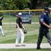 Milan senior left fielder Robert Barnier reacts to a scored run during the game against Richmond on Friday, June 14. Daniel Brenner I AnnArbor.com